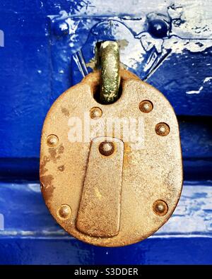 Large rusting padlock. Stock Photo