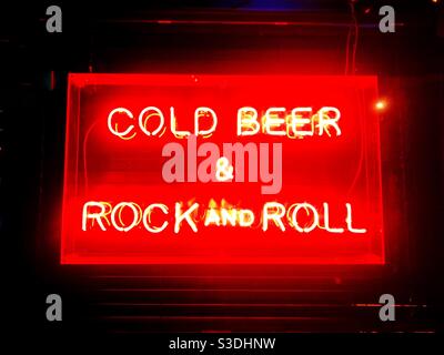 Cold beer & Rock and roll red neon sign, pubs reopening Stock Photo
