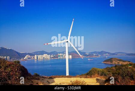 The HK Electric wind turbine on Lamma island in Hong Kong. Stock Photo