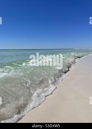 Ocean waves crashing on the shoreline on Florida beach Stock Photo