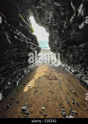 View from inside a sea cave looking out, Southerndown, South Wales. Stock Photo