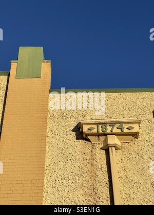 Detail of a historic building facade showing 1874 construction date in Inverell, New South Wales, Australia Stock Photo