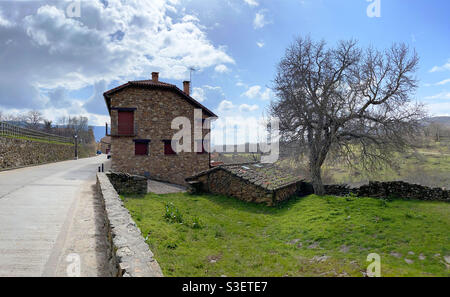 House and landscape, panoramic view. Horcajuelo de la Sierra, Madrid province, Spain. Stock Photo