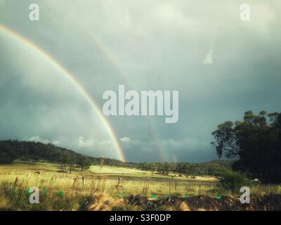Double rainbow in the Granite Belt, Queensland, Australia Stock Photo