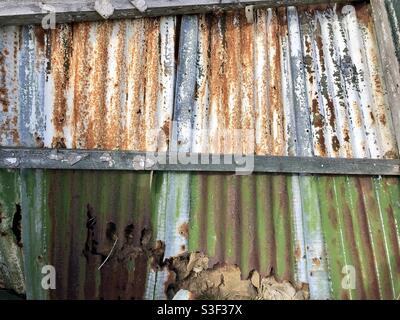 Rusting sheets of corrugated iron Stock Photo