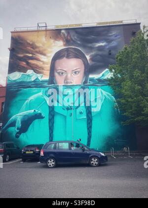 Greta Thunberg painted on the side of the Tobacco Factory Theatre, North Street, Bedminster, Bristol by aerosol artist Jody Thomas - May 2021 - climate change activist Stock Photo