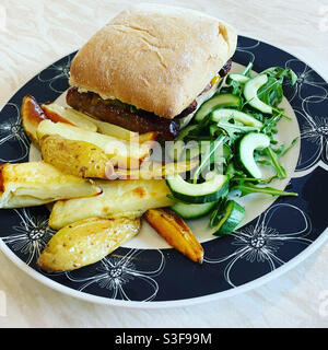 American Sausage Sarnie & Pickled Cucumber Relish. 11 May 2021. Stock Photo