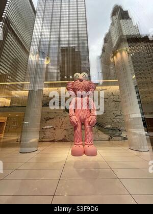 A giant pink sculpture by the avant-garde artist Kaws A giant pink sculpture by the avant-garde artist Kaws