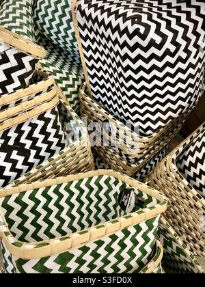 Stack of open-topped storage boxes with graphic zig-zag pattern. Stock Photo