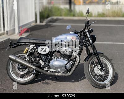 Royal Enfield motorcycle in chrome and black, number 71, on a parking lot in Lunel Viel near Montpellier, Occitanie, South of France Stock Photo