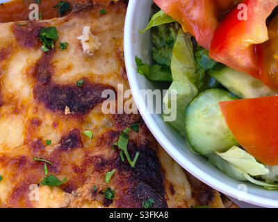 Traditional Greek moussaka with side salad, Limassol, Cyprus. Stock Photo