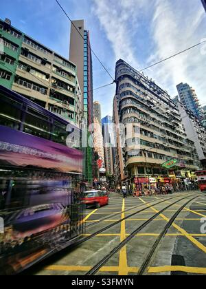 A moving tram in Wan Chai, Hong Kong. Stock Photo