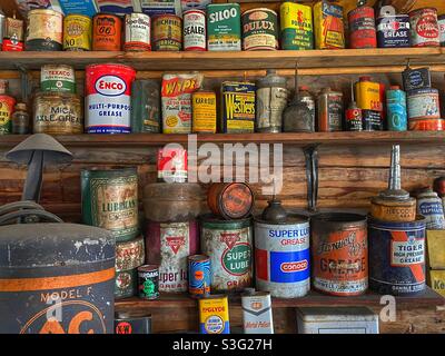 Old antique cans you would find in an automotive garage Stock Photo