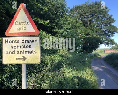Cattle grid sign in the English countryside, United Kingdom Stock Photo
