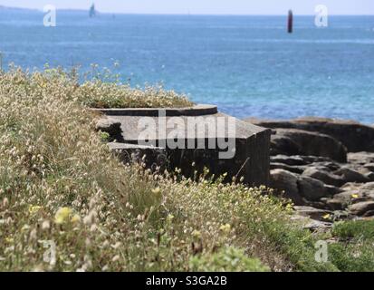 A bunker hidden in the dunes at the beach of Quiberon in Brittany on June 2021 Stock Photo