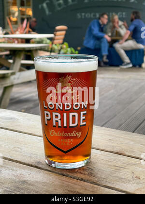 A pint of London pride beer in a pub in Hampshire the may fly nr Stockbridge Stock Photo
