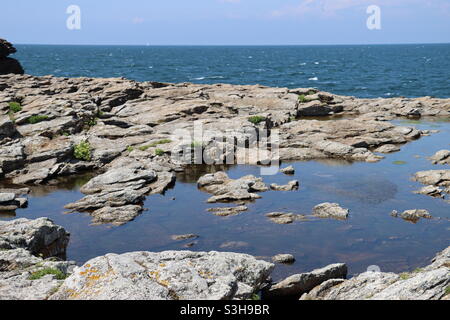 Ocean and rocks at the wild coast of Quiberon in Brittany, France Stock Photo