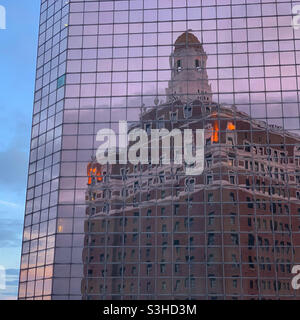 A sunset view of the Claridge Hotel reflected in Bally’s, Atlantic City, New Jersey, United States Stock Photo