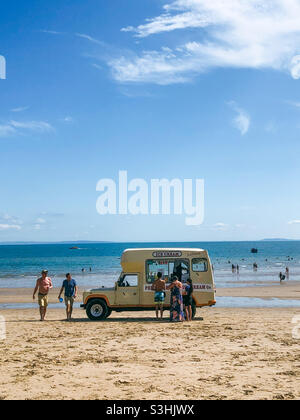 An ice cream on the beach at Tenby Stock Photo