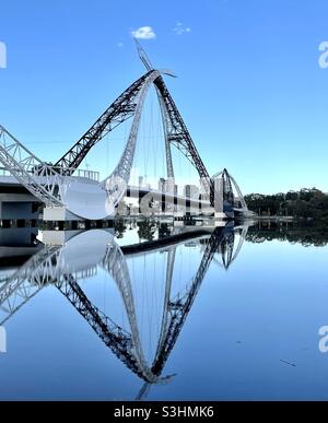 Matagarup Bridge and it’s reflection in the Swan River Perth Western Australia Stock Photo