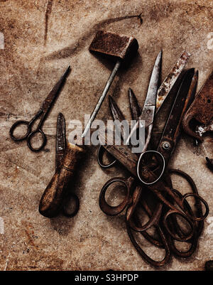 Old rusty scissors and some other DIY tools Stock Photo