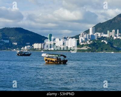 A view of Hong Kong island from Lamma island in Hong Kong. Stock Photo