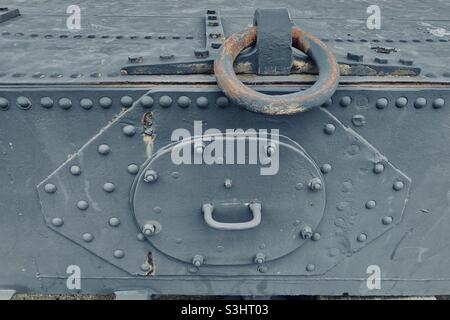 screwed lid on riveted plate with steel ring Stock Photo