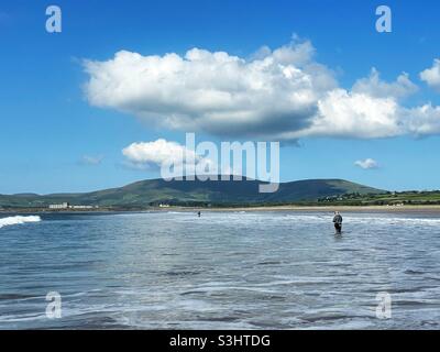 Anglers fishing the surf for bass on a beach in County Kerry, Ireland, August. Stock Photo