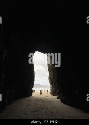 View out to Tourists and Waipati Beach from Cathedral Caves, Catlins Coast in Otago, New Zealand Stock Photo