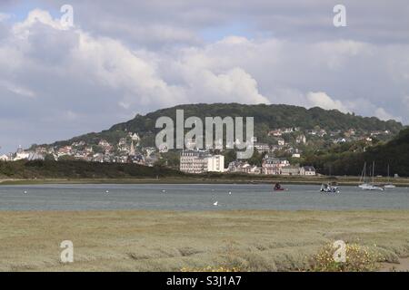 The river Dives at Dives Sur Mer in Normandy, in the French department of Calvados and the hill of Houlgate Stock Photo