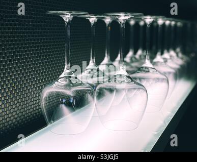 Row of wineglasses in a restaurant Stock Photo