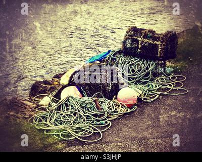 Close up of empty lobster pots with ropes used for sea fishing in boats Stock Photo