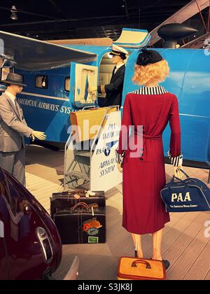The cradle of aviation Museum features a departure display of an early pan American Airways system playing with passengers and flight crew, Garden City Long Island, 2021, USA Stock Photo