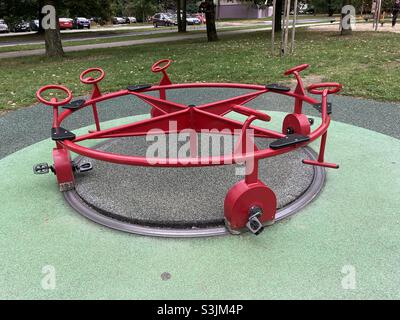6-seat merry-go-cycle on the playground Stock Photo