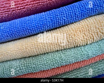 Close up detail of a stack of multi colored towels Stock Photo