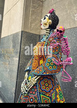 La Catrina statues on display at the Mexico week celebration of Dia de Muertos at the Rockefeller Center plaza, October 20 21, NYC, United States Stock Photo