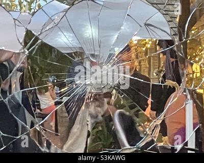 A broken mirror is part of the decor at Gardner Village’s annual “WitchFest” each October. Getting in tight on the glass makes for a nice abstract. Stock Photo