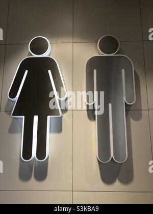 Toilet sign on the wall Stock Photo