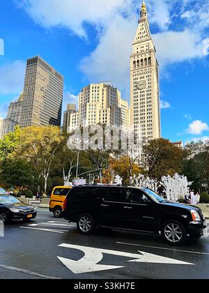 Traffic on Fifth Avenue moving past Madison Square, Park in the flatiron District, New York City, United States, 2021 Stock Photo