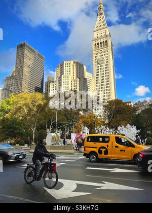 Taxi and other vehicles on fifth Avenue in front of Madison Square, Park at 23rd St., new York city, United States, 2021 Stock Photo