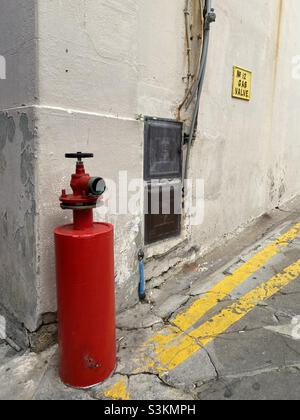 Fire hydrant on a street corner Stock Photo