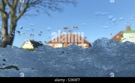 Snow on a car windscreen Stock Photo
