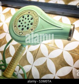 A 1950s vintage ‘Handy Hannah’ electric hair dryer in an exhibition of old homewares in Hong Kong Stock Photo