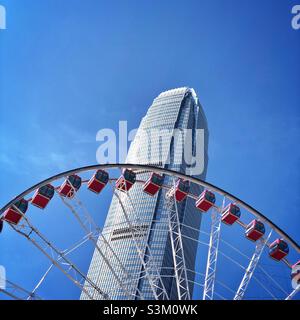2ifc (2 International Finance Centre), a skyscraper in Central and Hong Kong's second tallest building, and the Hong Kong Observation Wheel Stock Photo