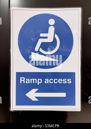 Ramp access for disabled wheelchair users sign at entrance Stock Photo ...