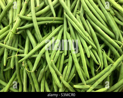 Thin beans on sale in a store. Stock Photo