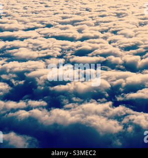 Clouds viewed from the window of an airplane Stock Photo