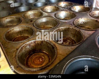 Empty, old and well used baking tins. Stock Photo
