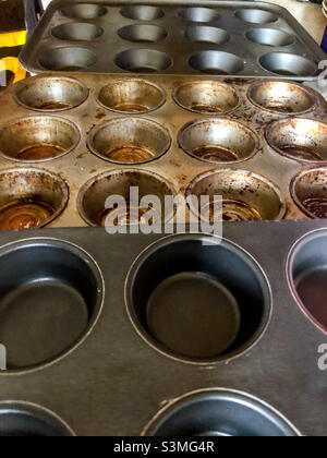 Old. Well used baking tins. Stock Photo