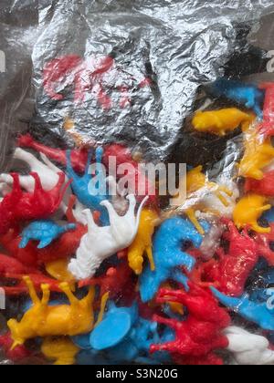 Plastic animals toys in plastic bag close up Stock Photo
